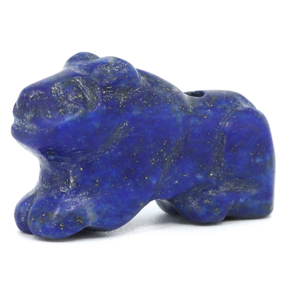 A Coptic Period Lapis Lazuli Lion Amulet, c. 3rd–7th Century AD: This exquisite Coptic period lion amulet, measuring a mere 2.5 cm in length, is a testament to the detailed artistry and rich symbolism of ancient Egypt. Carved from lapis lazuli, a stone revered for 