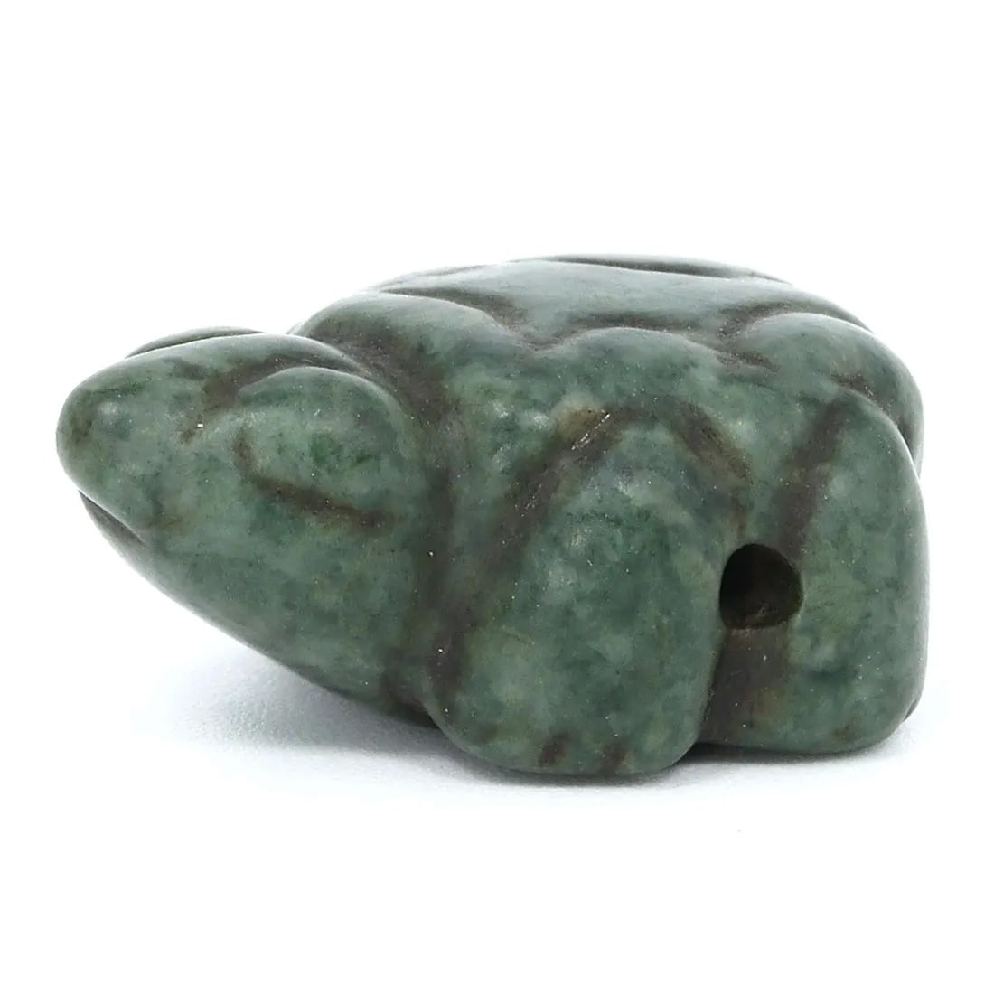 An Ancient Egyptian Green Stone Turtle Amulet: This petite green stone amulet, carved in the semblance of a turtle, hails from the venerable lands of Ancient Egypt. A symbol of longevity and protection, the turtle is a revered creature within Egyp
