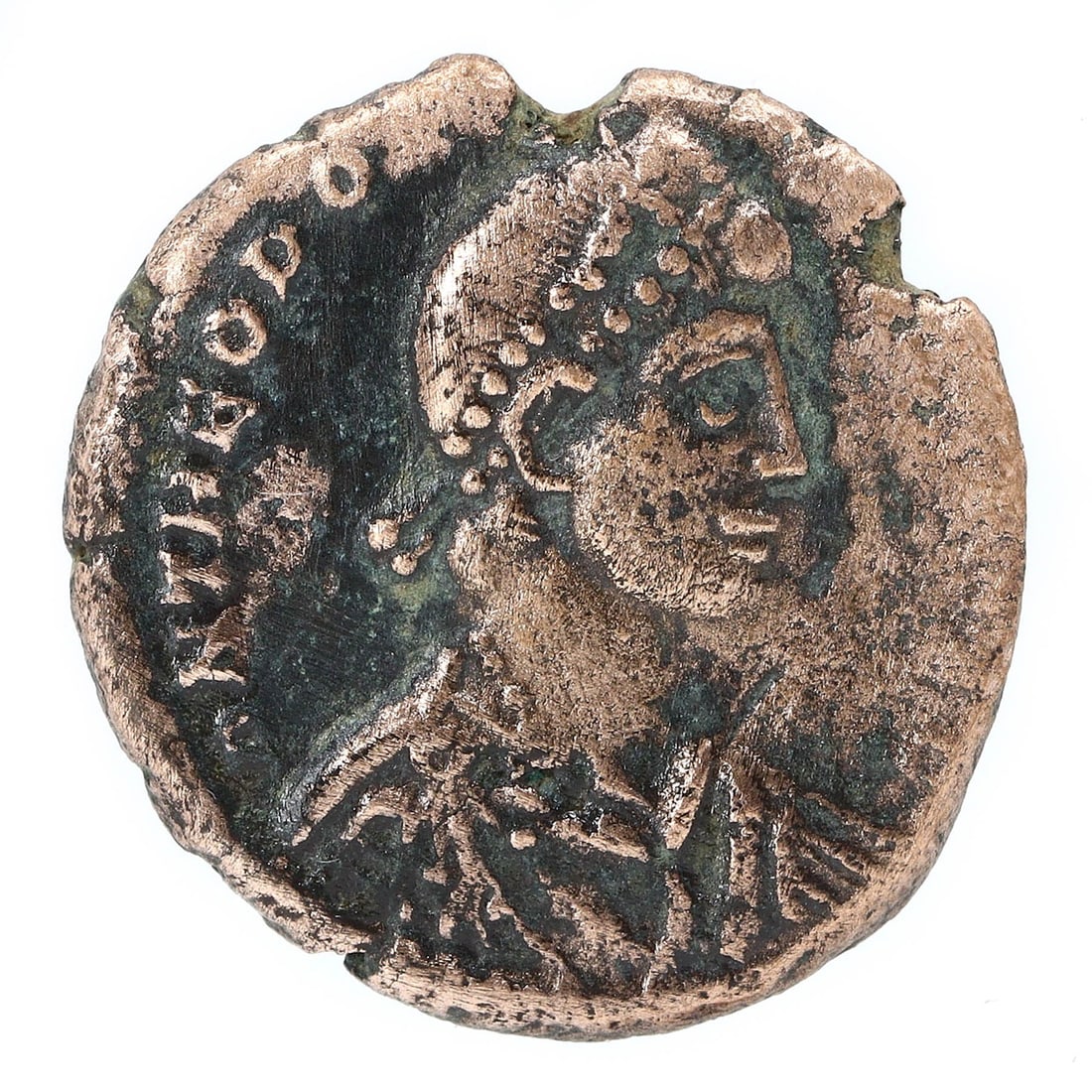 An Ancient Roman Empire Portrait Coin: This coin, from the vast reaches of the Ancient Roman Empire, bears the proud profile of an emperor, immortalized in bronze. Measuring 1.8 by 1.5 cm, it is a small relic from a mighty past. The obvers