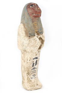 An Egyptian Ushabti of Taweret, the Hippo-Headed Goddess: This statuette, standing tall at 26 cm, represents Taweret, the deity of childbirth and fertility, intricately carved from wood and adorned with the remnants of paint. Its presence was believed to war