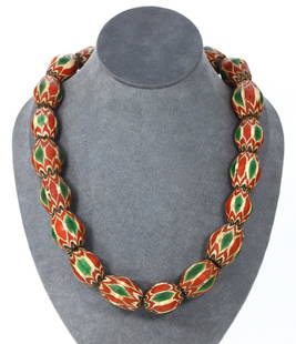 A Venetian Millefiori Glass Bead Necklace, Likely 19th Century: An exquisite piece of Venetian craftsmanship, this Millefiori glass bead necklace with a length of 30 inches is a testament to the intricate art of glassmaking that flourished during the 19th century.