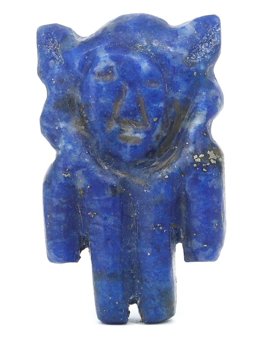 An Egyptian Azure Emissary: Miniature Ushabti in Lapis Lazuli: Behold a fragment of the deep blue heavens captured in the form of this miniature ushabti, a serene servant from Coptic Egypt. Crafted from the celestial stone of lapis lazuli, this artifact is small 