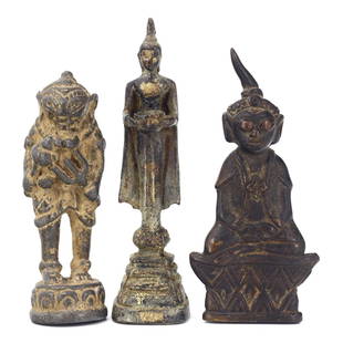 Group of 3 Antique Asian & Tibetan Bronze Figurines: This collection comprises three pieces of antique figurines that hail from Asia and Tibet, reflecting a rich tapestry of spiritual and cultural heritage. Each statue, varying in height with the talles