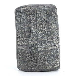 A Black Stone Tablet with Babylonian Cuneiform: This modern crafted black stone tablet, measuring 6 cm by 4 cm, bears the ancient Babylonian cuneiform script, a testament to the enduring legacy of Mesopotamian civilization. The inscriptions, intric