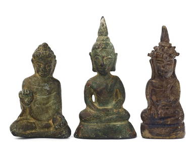 A Triad of Southeast Asian Buddhist Bronze Sculptures: A silent testament to spiritual devotion, this triad of Southeast Asian Buddhist sculptures speaks volumes of the region's artistic heritage. Crafted in bronze, each figure exudes an aura of meditativ