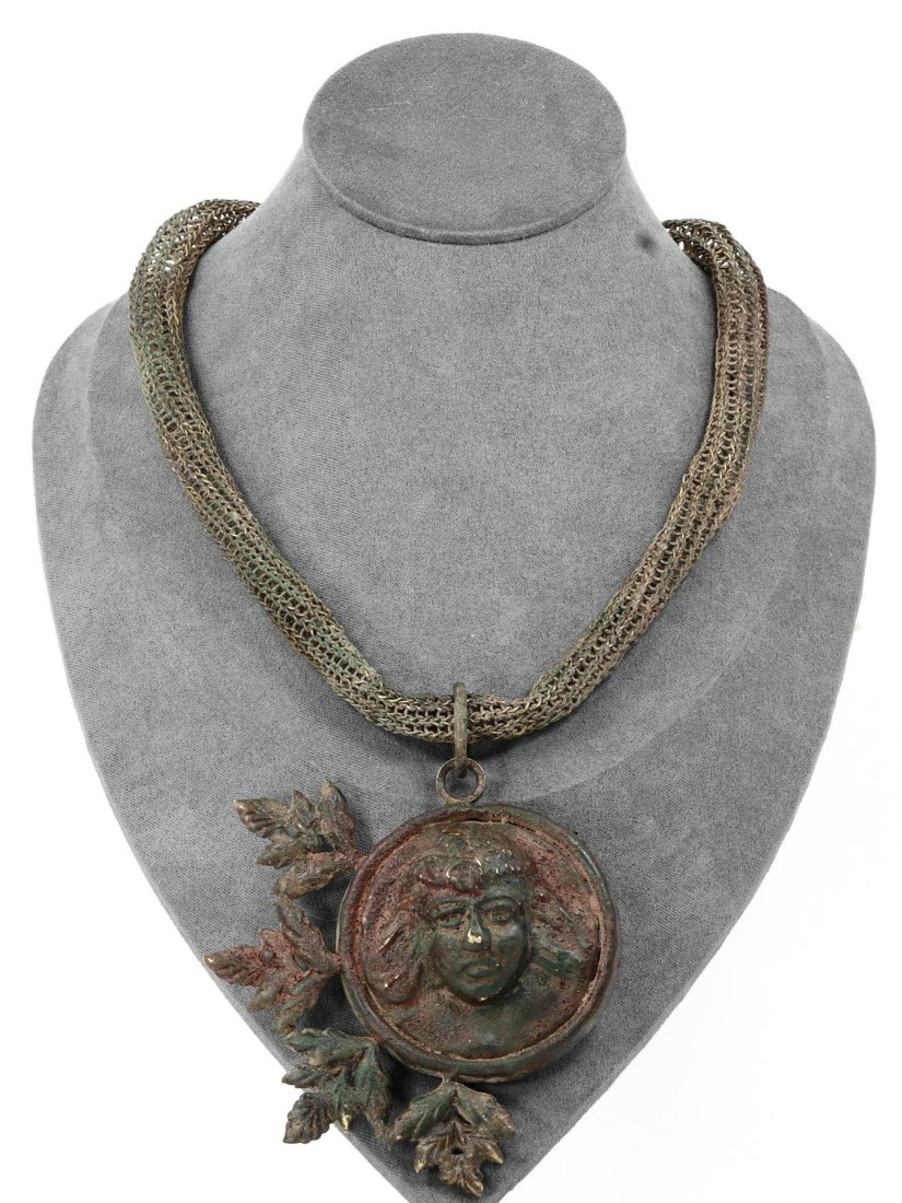 An Grecian Female Medallion Necklace, Hellenistic Period: Dimensions: Length: 22 inches (55.88 cm)