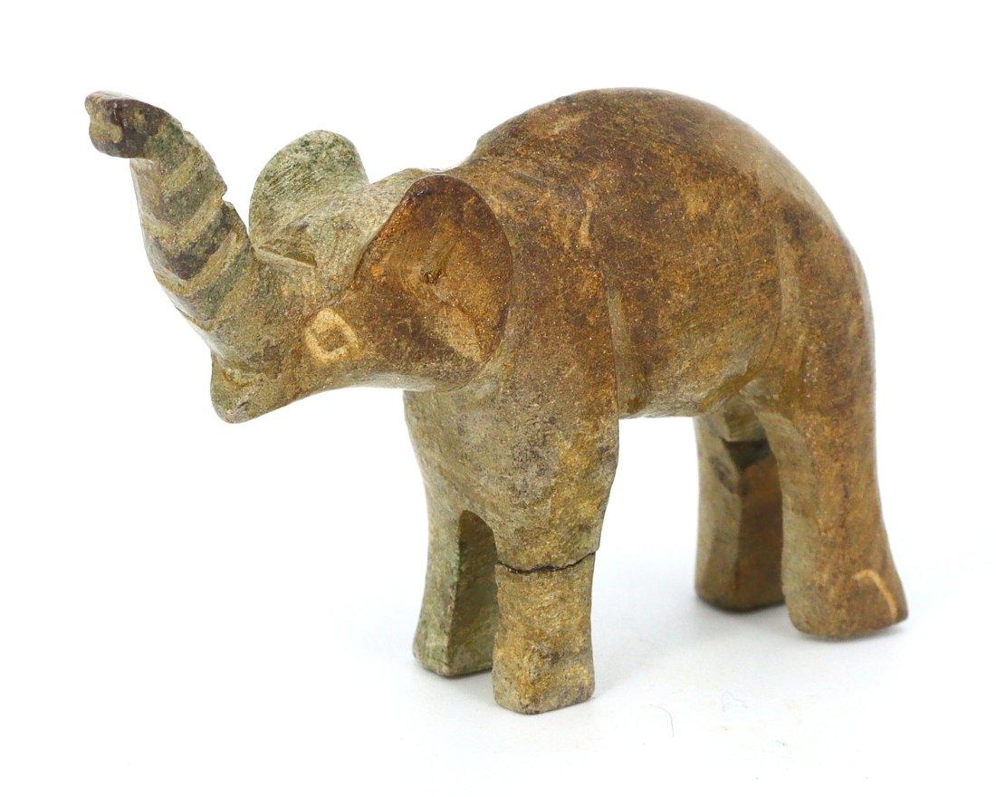 An African Steatite Elephant Figurine: Dimensions: 1.57 x 1.18 inches (4 x 3 cm)