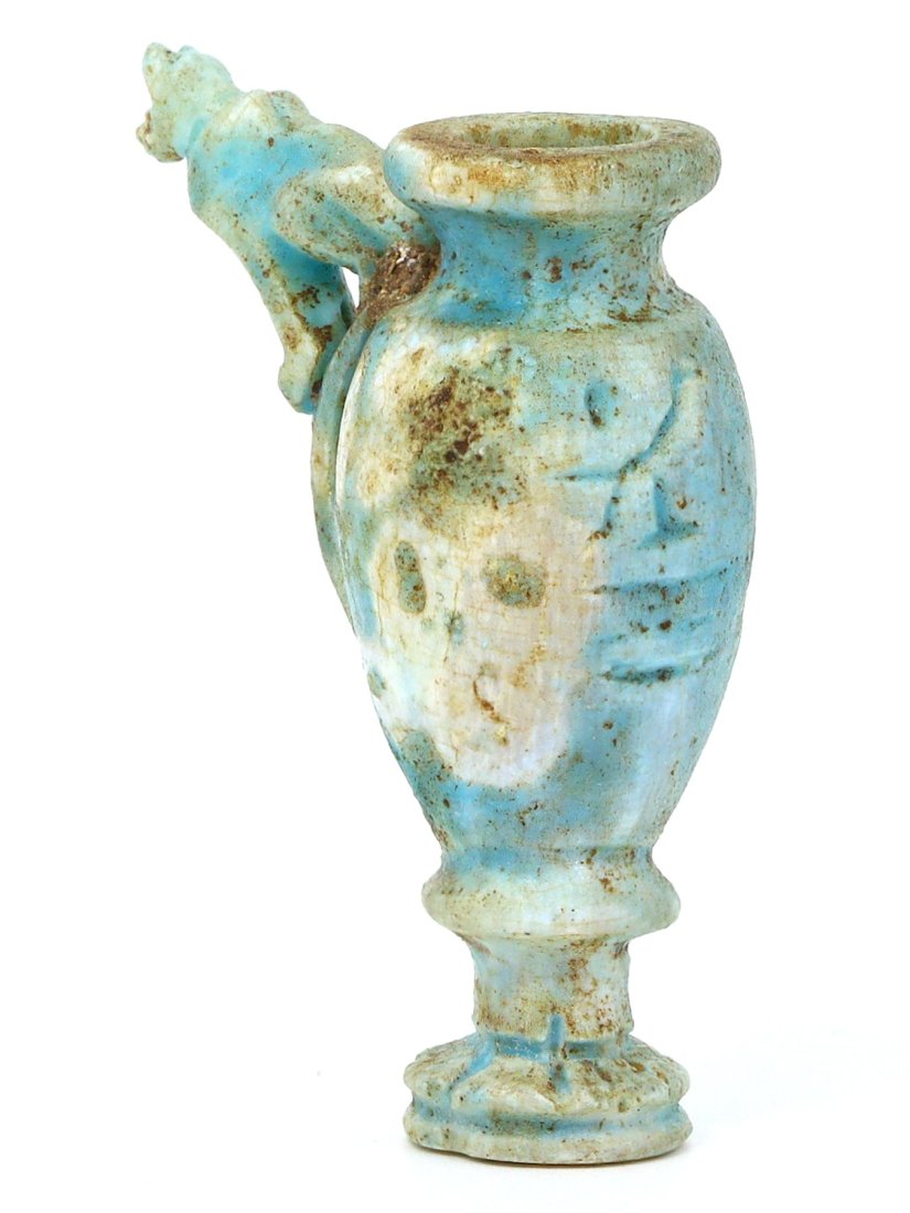 An Egyptian Faience Vase with Bastet Figurine Handle: Dimensions: 2.36 x 1.77 inches (6 x 4.5 cm)