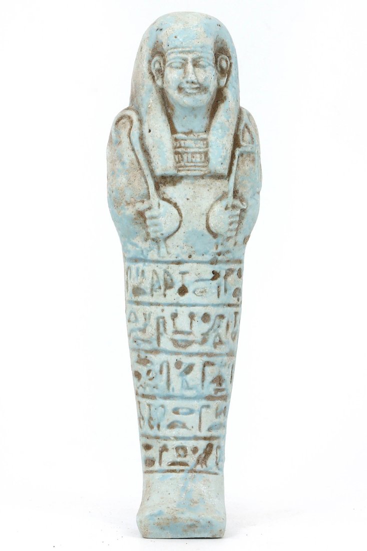 An Egyptian Faience Ushabti with Enduring Witness: Dimensions: 4.72 x 1.57 inches (12 x 4 cm)