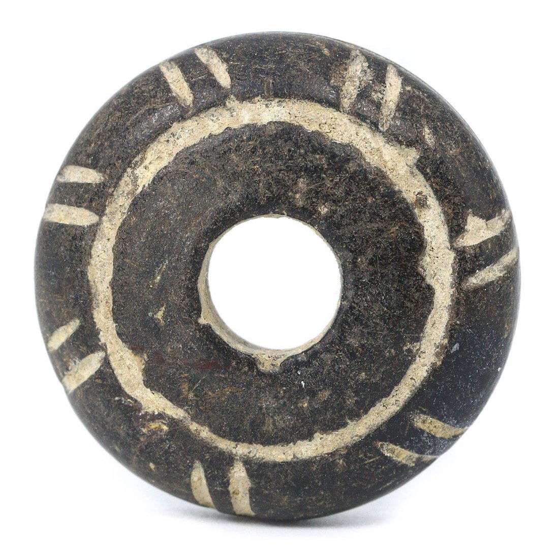 A Neolithic Stone Spindle Whorl with Geometric Patterns, Circa 5000-2500 BCE (1 of 2)