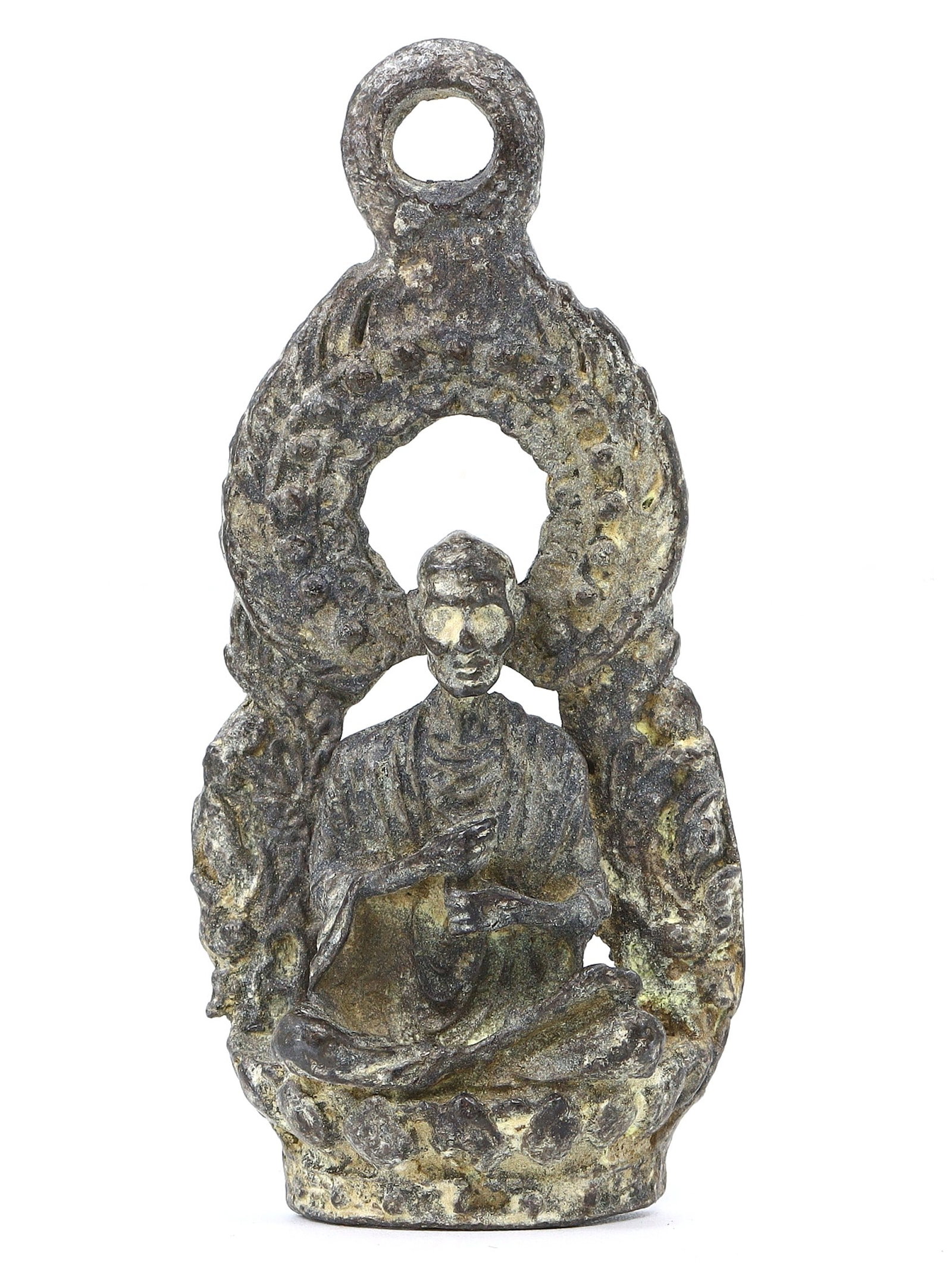 An Ancient Southeast Asian Lead Votive Figure in Meditation, 14th-15th Century: This serene lead votive figure from Southeast Asia, seated in dhyanamudra, captures the essence of meditation and enlightenment pursued in the 14th-15th centuries. The finely articulated halo reflects