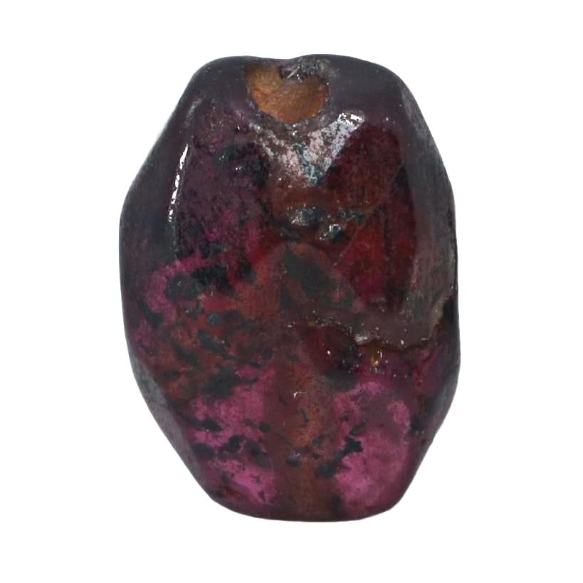 Antique Medieval Red Garnet Bead, c. 8th–15th Century CE: Crafted during the Middle Ages, a time rich in artisanal innovation, this red garnet bead displays the period's shaping skills. Garnets were highly valued for their perceived protective properties and