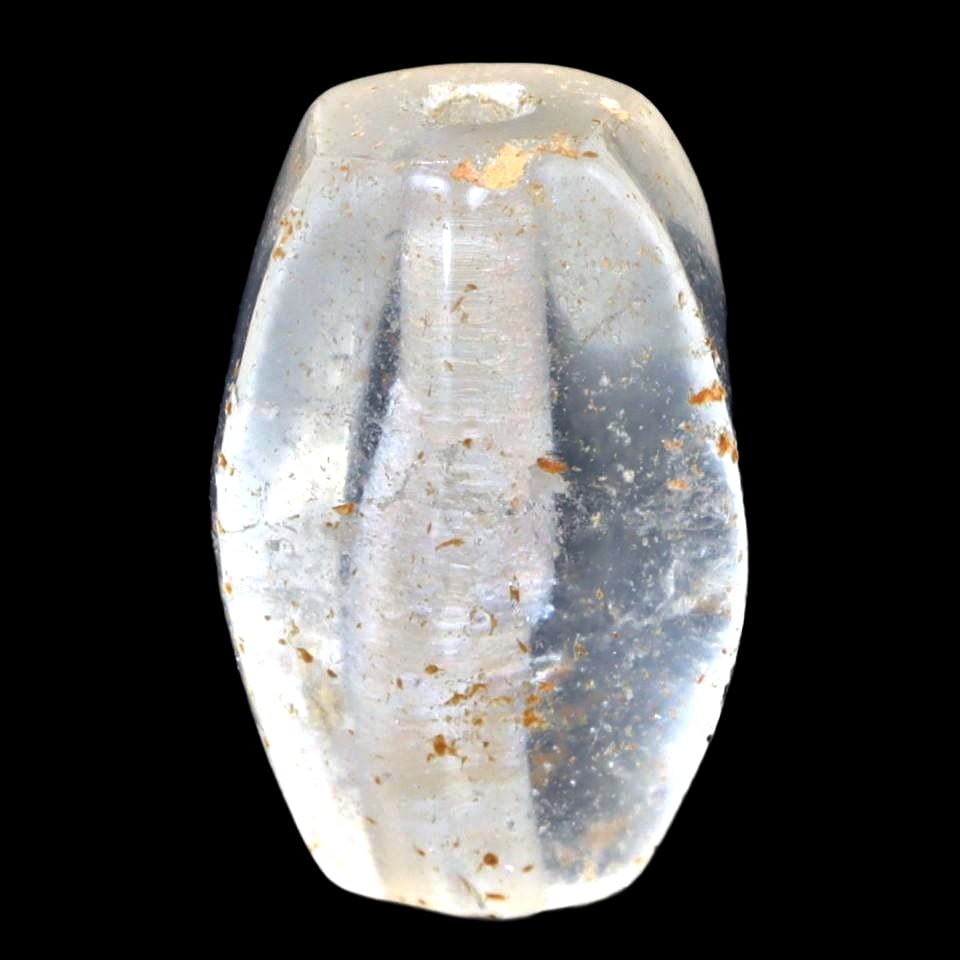 An Antique Mughal Empire Faceted Rock Quartz Bead, c. 16th-19th Century: Exemplifying the splendor of the Mughal Empire's fascination with crystal, this faceted rock quartz bead reflects the precision and skill of Mughal lapidaries. Its geometric facets catch the light, il
