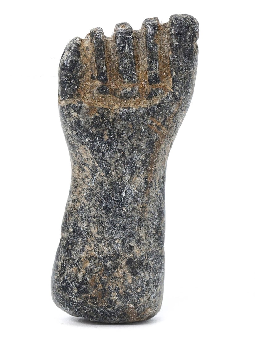 An Ancient Egyptian Steatite Fist Bead - Late Period, 664-332 BC: A meticulously carved steatite fist bead from Ancient Egypt, Late Period, a testament to the skilled craftsmanship and symbolic potency in personal adornments of the era. Serving both as a decorative