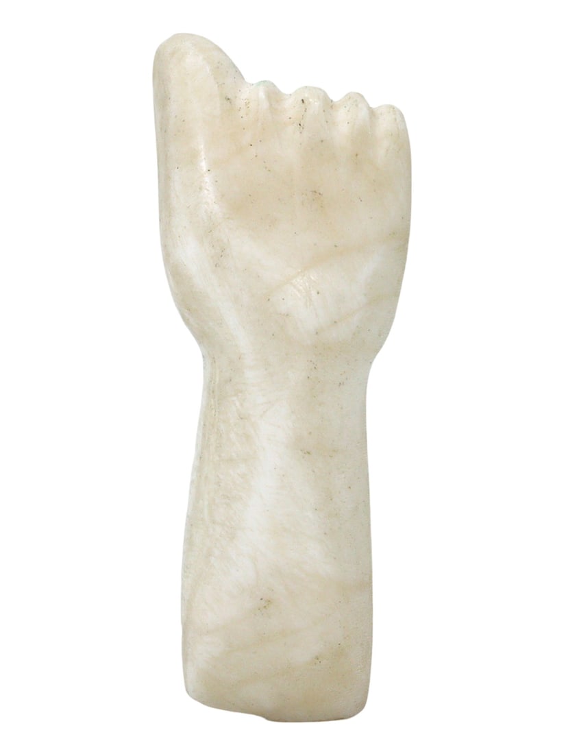 An Ancient Egyptian Alabaster Fist Amulet, Late Period, 664-332 BC: This ancient Egyptian alabaster amulet represents strength and protection. Carved in the shape of a clenched fist, it would have been a potent symbol for its owner, akin to carrying the power of a dei
