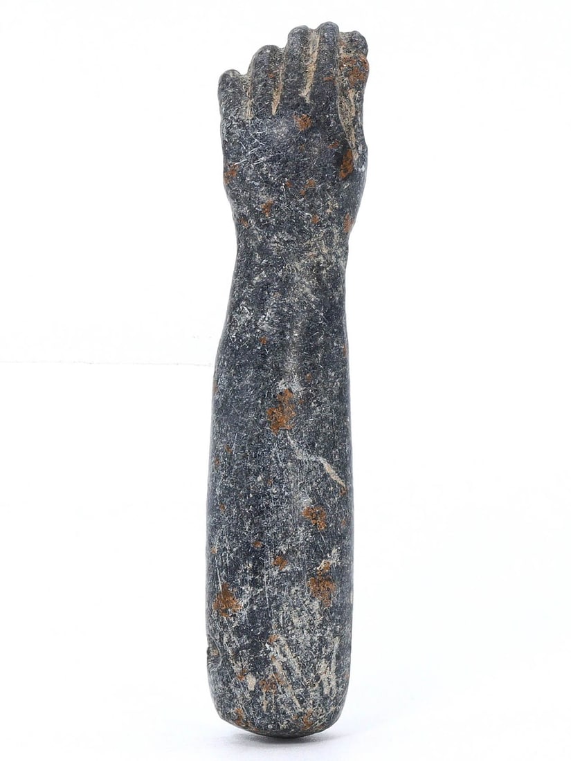 An Ancient Egyptian Steatite Fist Bead - Late Period, 664-332 BC: A meticulously carved steatite fist bead from Ancient Egypt, Late Period, a testament to the skilled craftsmanship and symbolic potency in personal adornments of the era. Serving both as a decorative