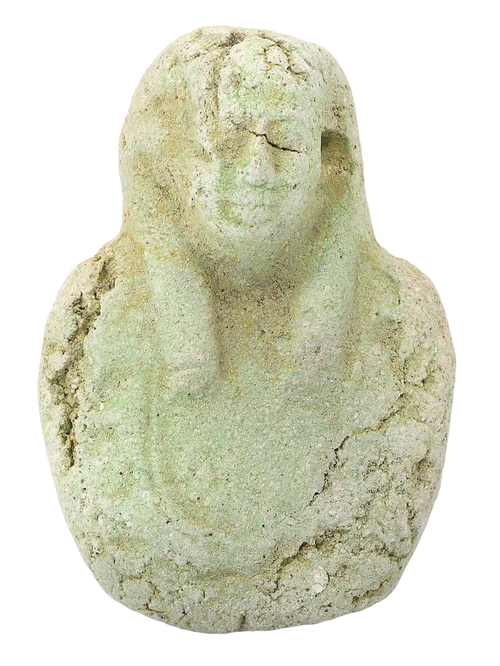 A Faience Pharaoh Amulet, Late Period/Revival: This faience amulet, resembling a pharaoh, may draw its roots from the Late Period of ancient Egypt or emerge from a revival era. Its compact form and stylized features pay homage to the enduring lega