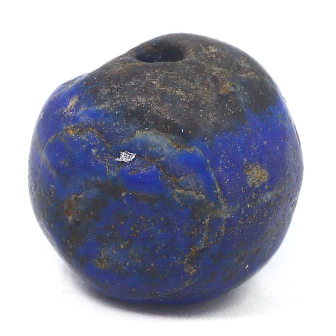 An Islamic Abbasid or Seljuk Empires Lapis Lazuli Bead, c. 8th–14th Century CE: A gem from the Islamic Golden Age, this lapis lazuli bead, with its deep celestial blue, is a relic of the Islamic empires' prosperity, where such materials were coveted for their beauty and supposed 