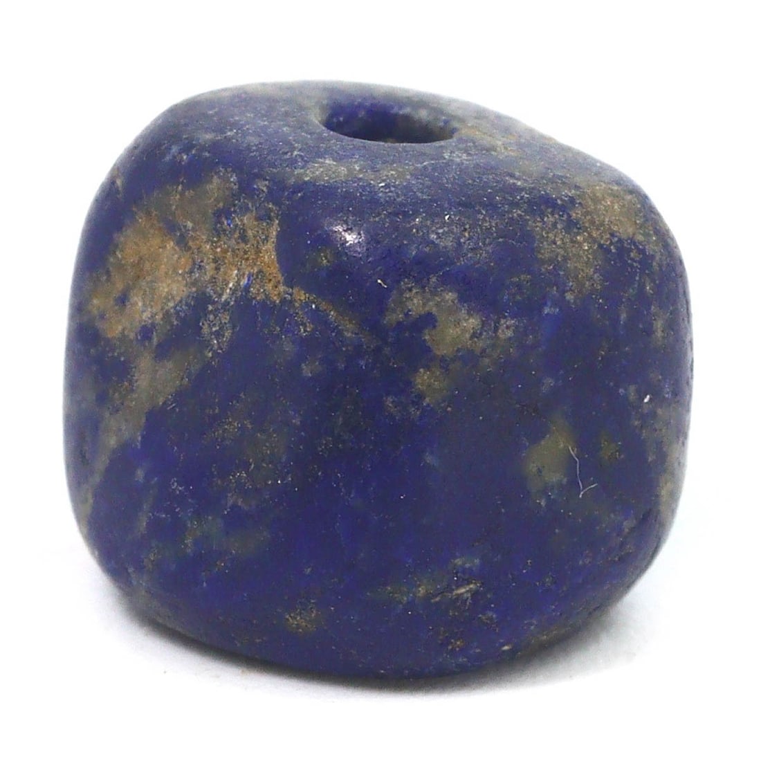An Islamic Abbasid or Seljuk Empires Lapis Lazuli Bead, c. 8th–14th Century CE: A gem from the Islamic Golden Age, this lapis lazuli bead, with its deep celestial blue, is a relic of the Islamic empires' prosperity, where such materials were coveted for their beauty and supposed 