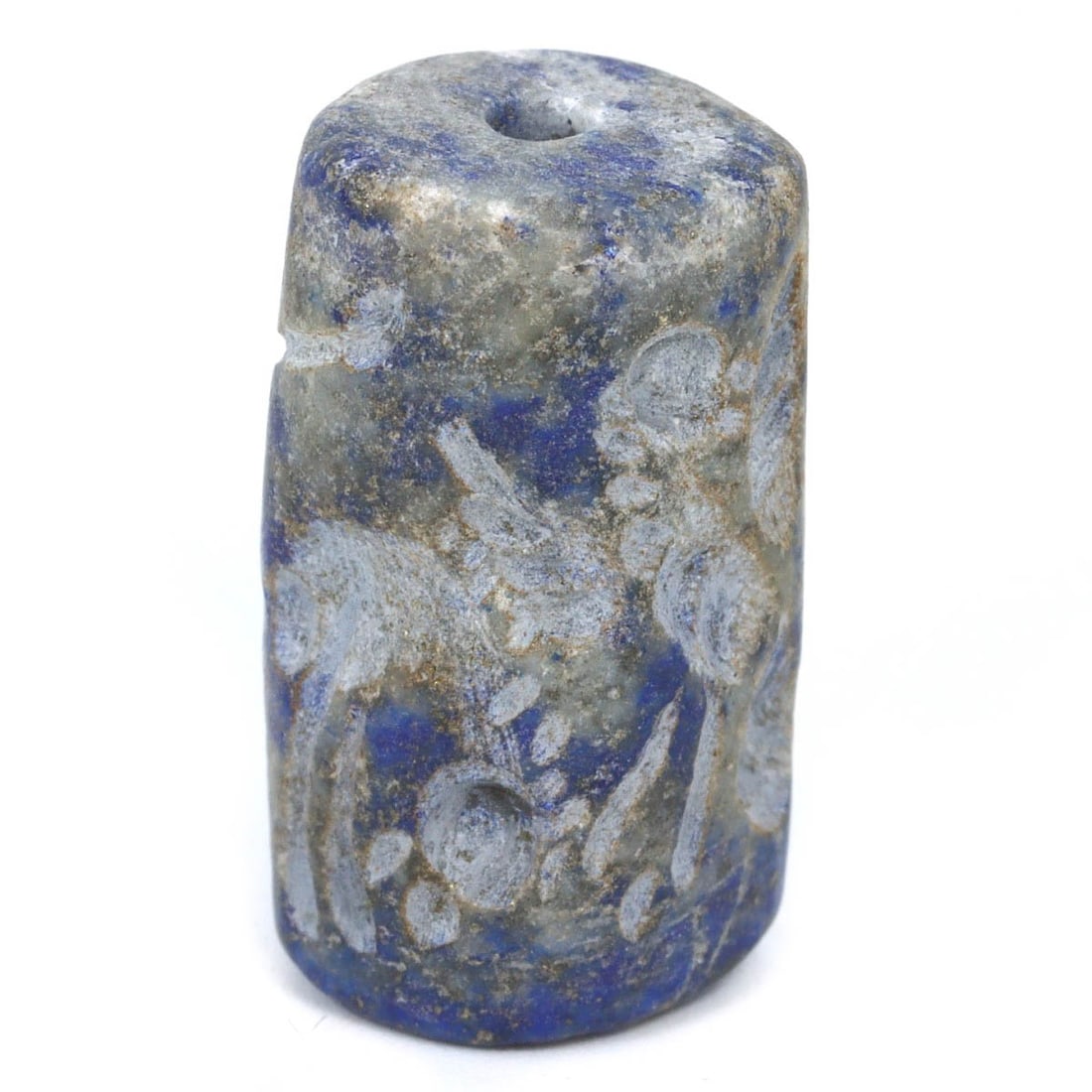 An Antique Sasanian Lapis Cylinder Seal, Circa 224-651 AD: This exquisite Sasanian cylinder seal, crafted from lapis lazuli, dates back to between 224 and 651 AD, during the Sasanian Empire's prominence in Persia. The seal measures 2 cm in length and 1 cm in 