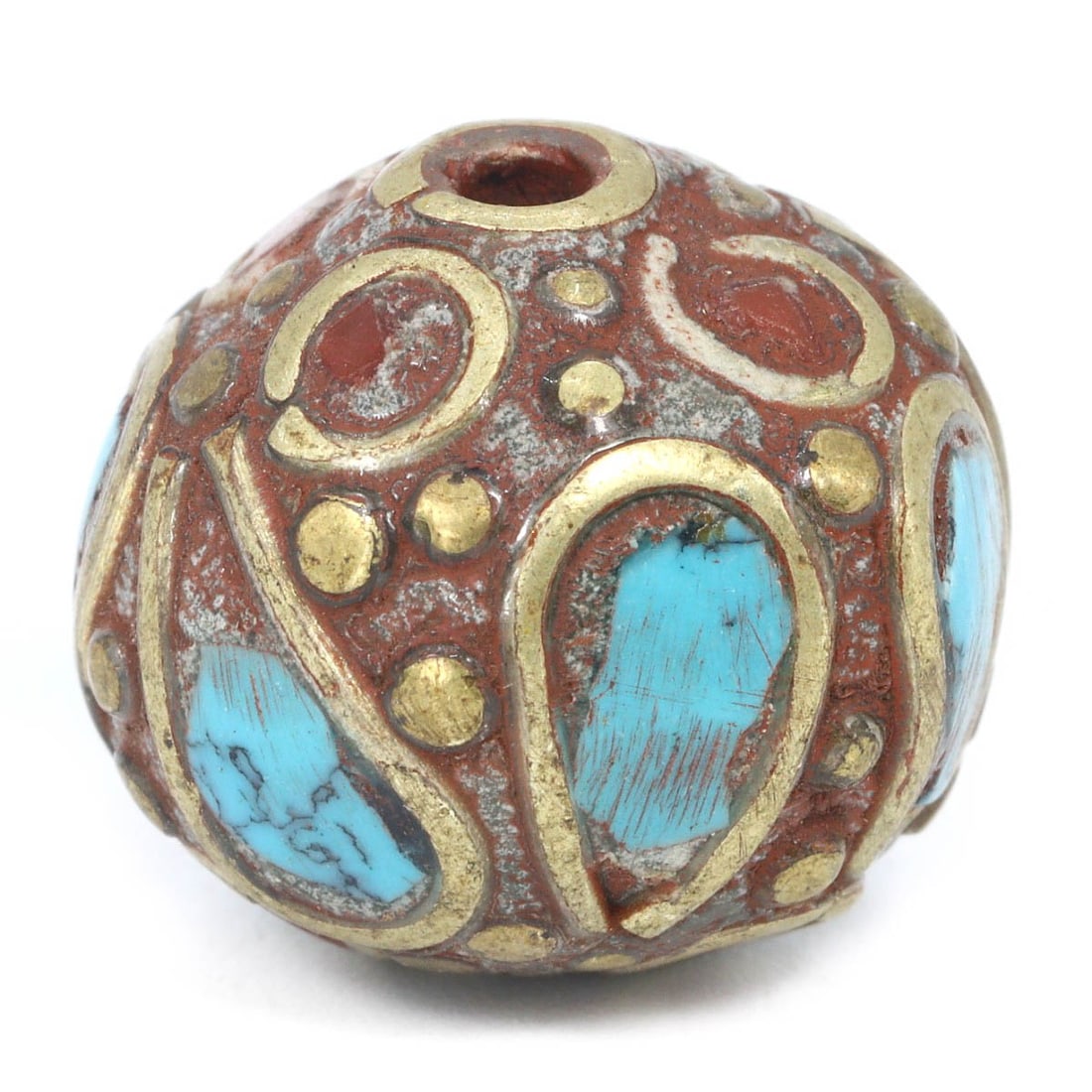 Antique Tibetan Bead with Turquoise Inlay and Gold Accents, ca. 19th-20th Century: This ornate Tibetan bead, measuring 1.8 x 1.5 cm, is a striking example of traditional craftsmanship. It features vibrant turquoise inlays set against a rich, red-brown background, highlighted with go