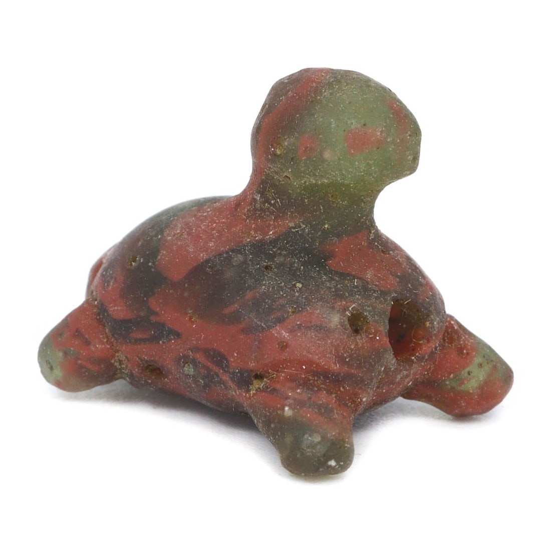 Ancient Near Eastern Jasper Zoomorphic Amulet, Roman Period, c. 1st Century BCE - 1st Century CE: This exquisite 1.5 x 1.2 cm zoomorphic amulet, sculpted from jasper, hails from the Roman Period, specifically around the 1st century BCE to the 1st century CE. The craftsmanship reflects the Roman ap