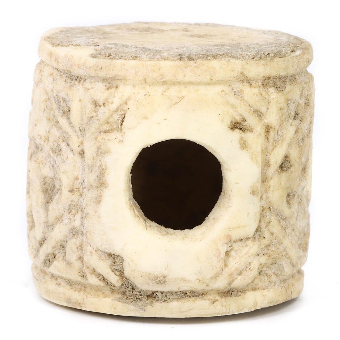 An Ancient Bone Carved Container, Likely Ritual Use, Circa 1st Millennium AD: This small container, expertly carved from bone, may have served a ritualistic purpose, perhaps holding precious oils or substances for ancient ceremonial practices. Its surface is etched with delicat