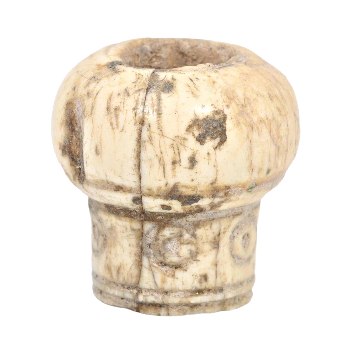 An Ancient Nishapur Carved Bone Head of a Stick, c. 10th-11th Century CE: Category: Ornaments and Dress Accessories This piece of carved bone, depicting the head of a stick, originates from Nishapur, one of the great centers of the Islamic world during the medieval period. 
