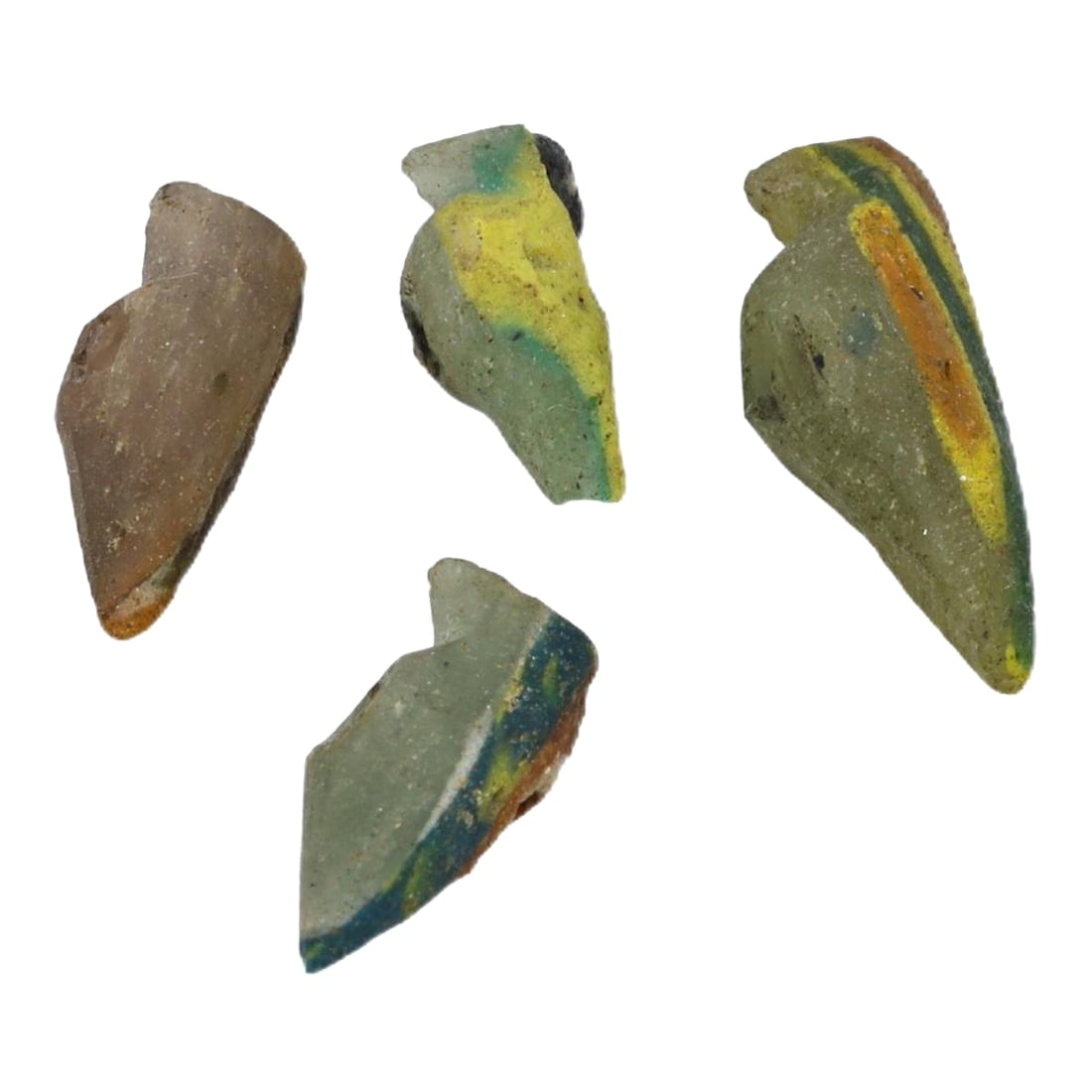 A Collection of Four Ancient Roman-Byzantine Glass Bird Form Beads, c. 1st-5th Century CE: Category: Beads and Jewelry Components These four glass beads, shaped like birds and dating from the Roman to Byzantine periods, demonstrate the continuity and evolution of glassworking techniques ove