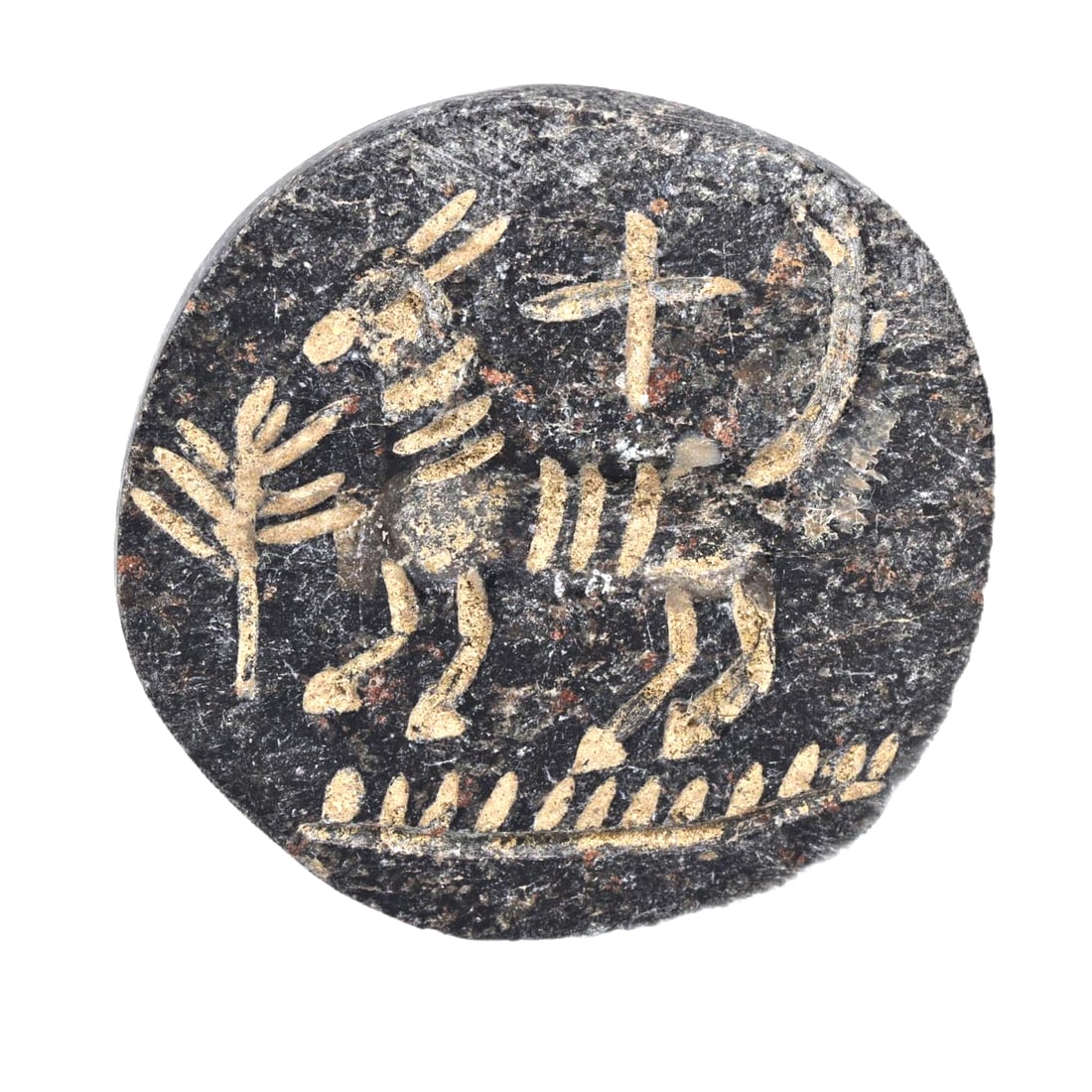 Ancient Achaemenid Empire Steatite Stamp Seal, c. 550-330 BCE: Category: Stamp Seals This steatite stamp seal from the Achaemenid Empire period, dating between 550 and 330 BCE, showcases intricate carvings of a grazing animal surrounded by symbolic motifs. Its we