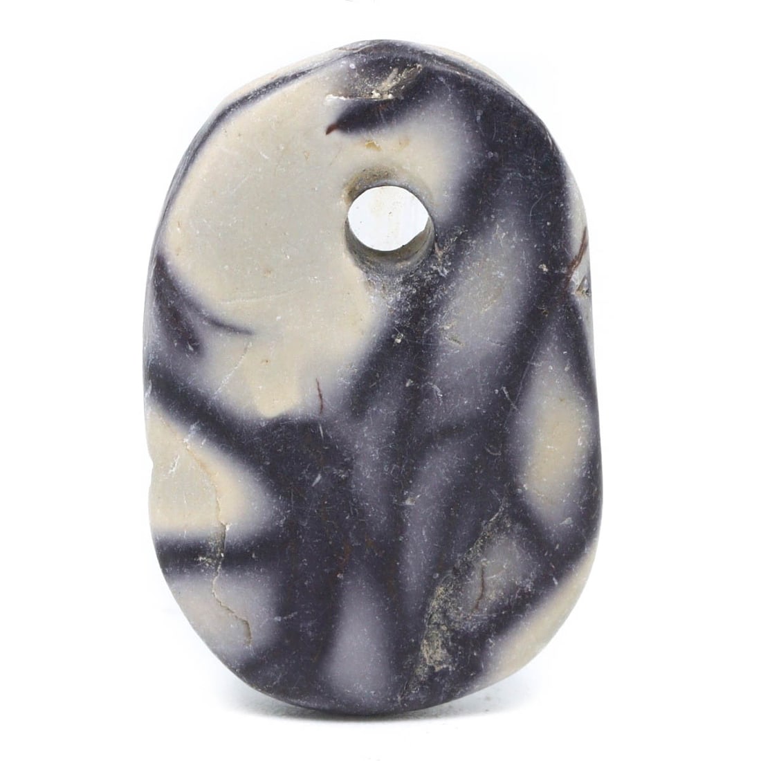 An Antique Jasper Islamic Era Amulet Bead: Category: Pendants and Figurines This finely crafted jasper amulet bead from the Islamic era represents both spiritual significance and artistic craftsmanship. The bead's smooth, variegated surface an