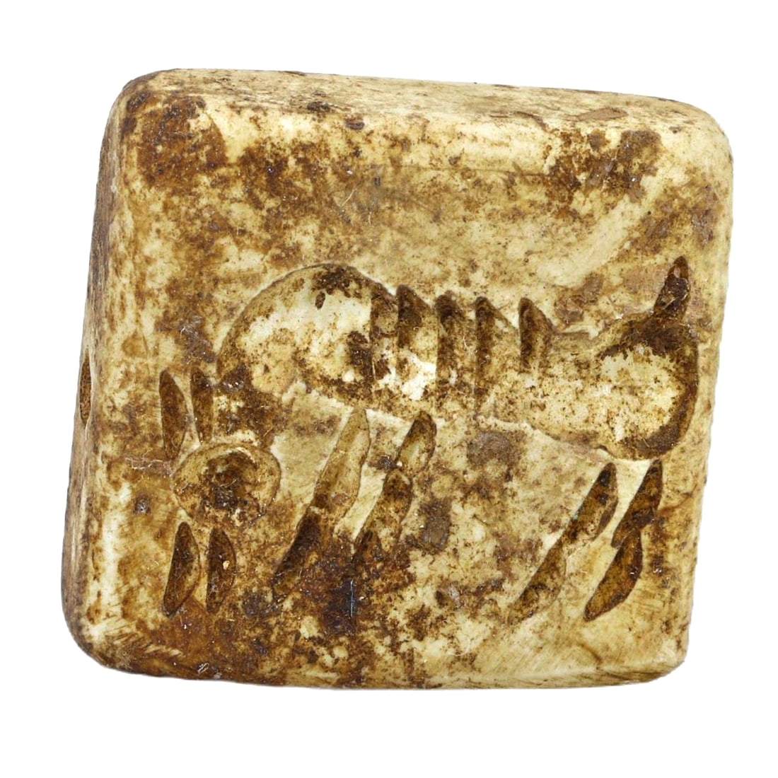 An Ancient Persian Dice-Backed Stamp Seal, c. 1st Millennium BCE: Category: Sealings This unique artifact, an ancient Persian stamp seal featuring a dice-backed design, dates back to the 1st millennium BCE. It combines practical function with a gaming element, refle