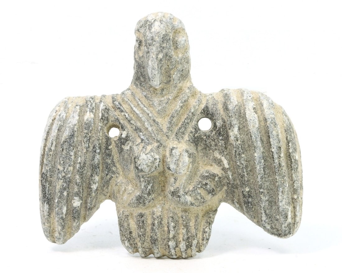 An Ancient Steatite Bird Figurine from the 2nd Millennium BCE: This artifact hails from the height of the Bronze Age, a period marked by significant cultural and technological advancements. The bird, meticulously carved from soapstone, exhibits the stylized forms