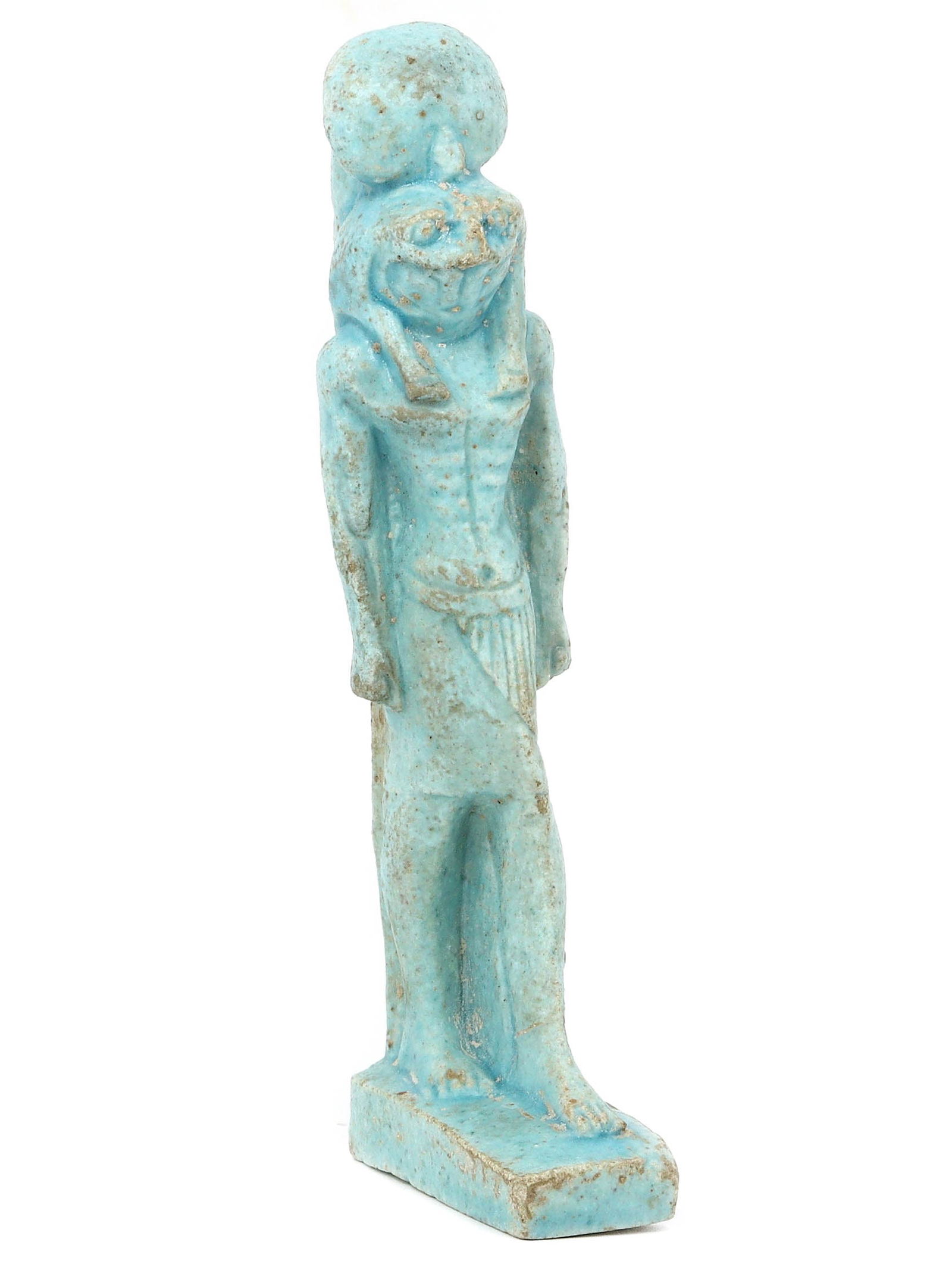 An Antique Egyptian Revival Faience Osiris Figurine, c. 19th Century CE: This Osiris figurine, made from vibrant turquoise faience, was inspired by Late Period artifacts and crafted during the Egyptian Revival. It reflects the advanced ceramic arts of ancient Egypt, reinte