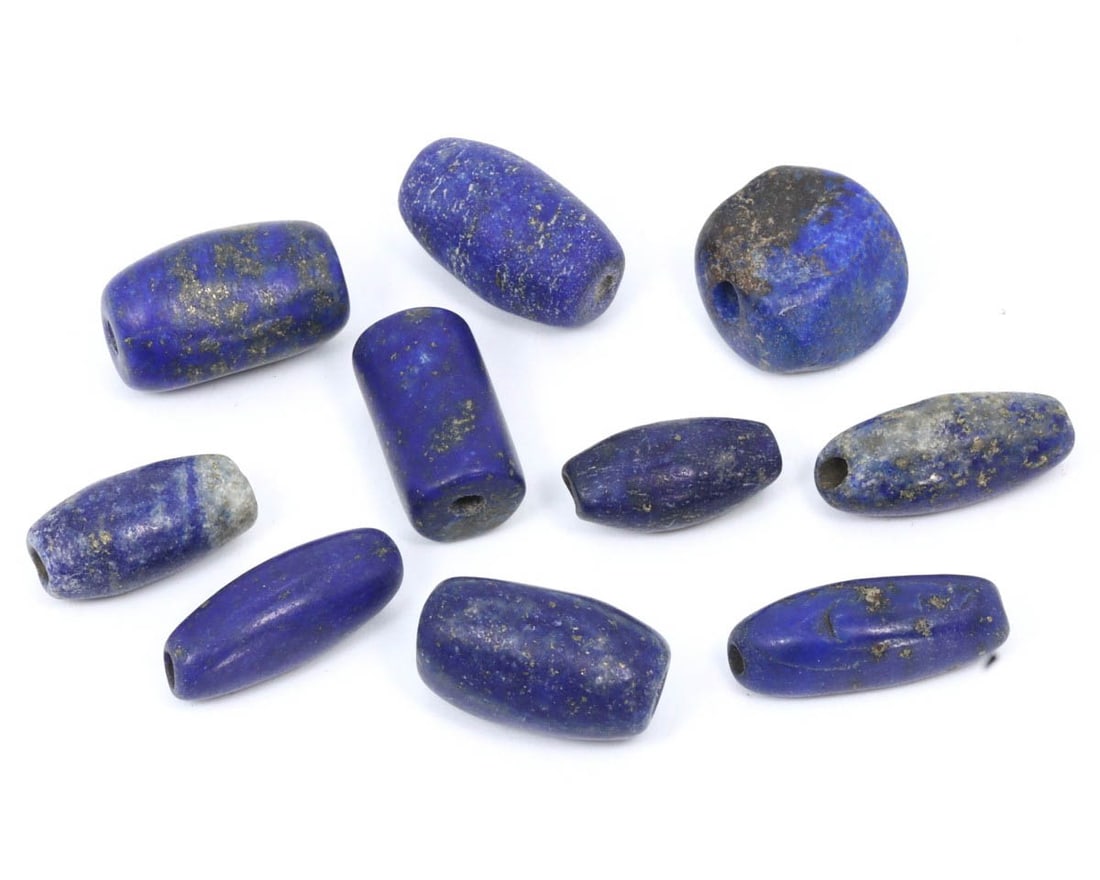 Collection of Ancient Persian Lapis Lazuli Beads, Achaemenid Empire, c. 550–330 BCE: This collection of lapis lazuli beads from the Achaemenid Empire demonstrates the luxury and aesthetic preferences of ancient Persian society. Lapis lazuli, prized for its deep blue hue, was often use