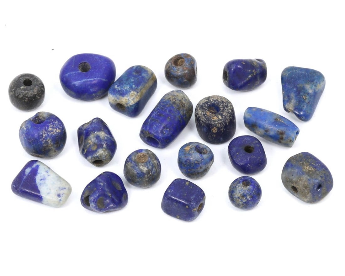 Collection of Ancient Persian Lapis Lazuli Beads, Achaemenid Empire, c. 550–330 BCE: This collection of lapis lazuli beads from the Achaemenid Empire demonstrates the luxury and aesthetic preferences of ancient Persian society. Lapis lazuli, prized for its deep blue hue, was often use