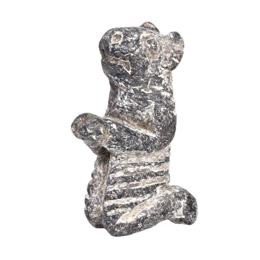 An Ancient Achaemenid Empire Steatite Zoomorphic Figurine, c. 550–330 BCE: This steatite zoomorphic figurine, originating from the Achaemenid Empire era between 550 and 330 BCE, showcases the refined artistic styles that flourished under Persian rule. Its design suggests it 