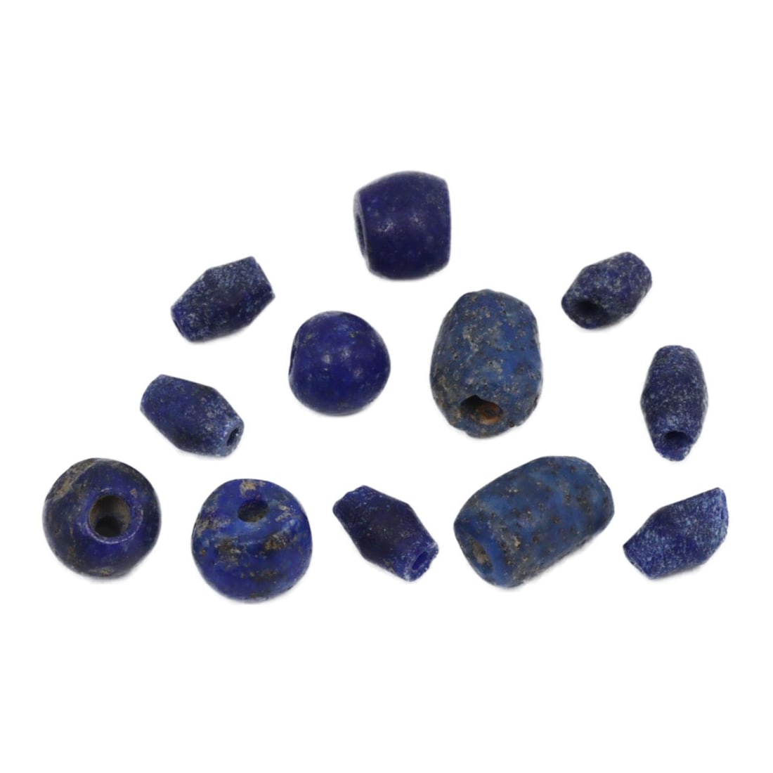 Collection of Ancient Persian Lapis Lazuli Beads, Achaemenid Empire, c. 550–330 BCE: This collection of lapis lazuli beads from the Achaemenid Empire demonstrates the luxury and aesthetic preferences of ancient Persian society. Lapis lazuli, prized for its deep blue hue, was often use
