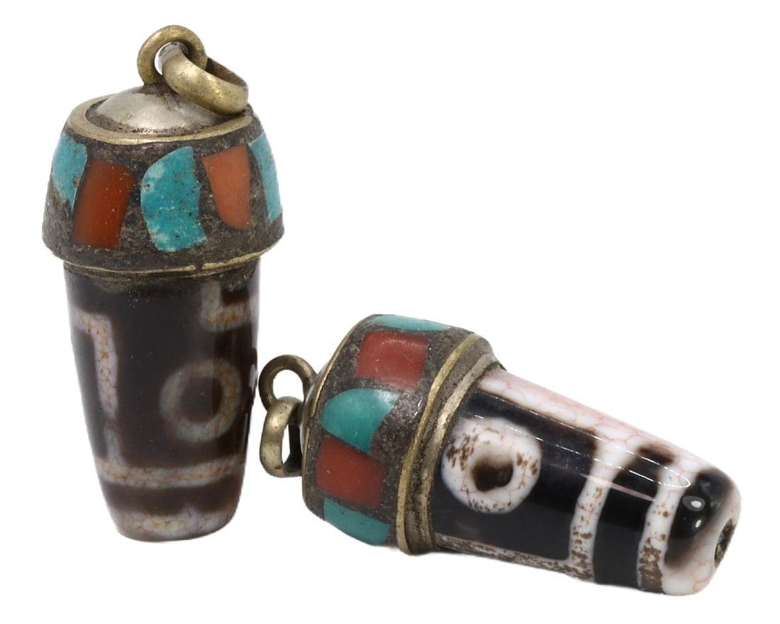 Lot of 2 Vintage Mid-Century Tibetan Agate Locket Amulets, c. 1950s: These distinctive Tibetan agate locket amulets from the 1950s exhibit the rich cultural craftsmanship of the region. Made of agate with intricate inlaid patterns of turquoise and coral, these pieces r