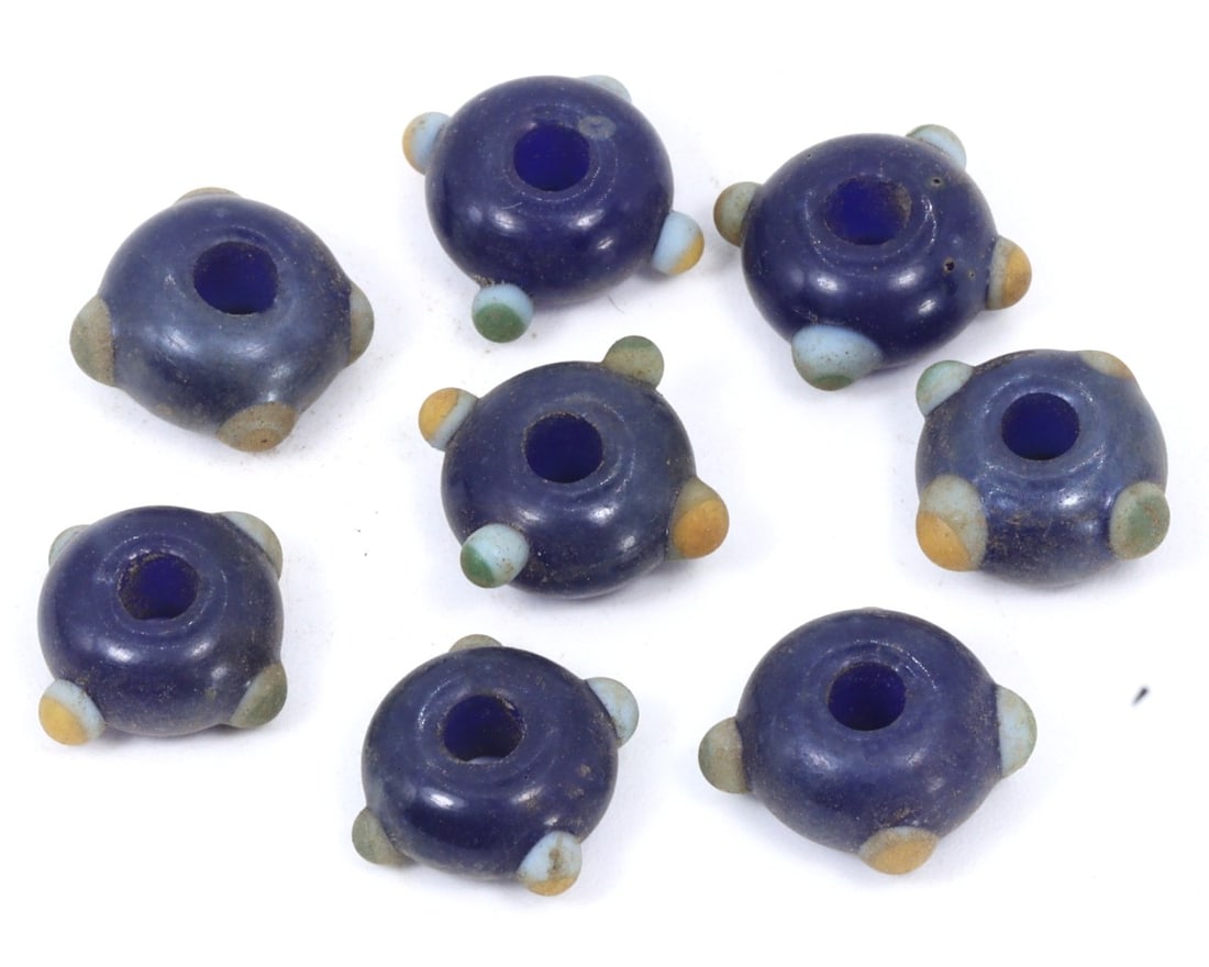 Lot of Antique Byzantine Wound Glass Collection of Beads, c. 500-1100 AD: This collection of beads, made from caviar, cobalt, and indigo wound glass with mosaic glass insets. Dating back to the Byzantine period (c. 500-1100 AD), it exemplifies the intricate craftsmanship an