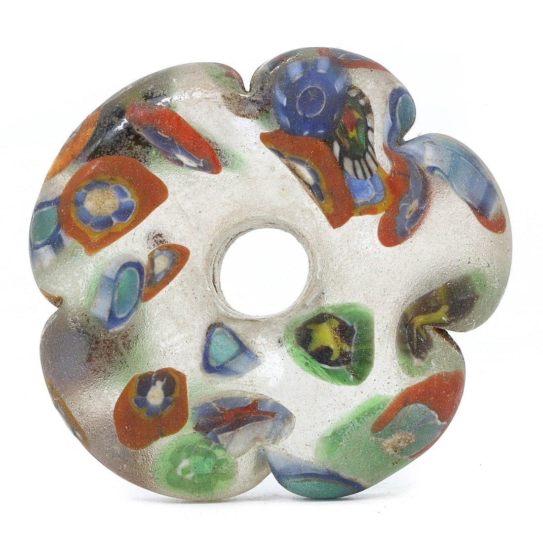 An Antique Millifiori Glass Bead from the Venetian Trade Era, 17th - 18th Century AC: This exquisite antique millifiori glass bead, with its complex floral patterns, is a testament to the Venetian trade era's masterful glasswork. Each segment of color is a window into the rich history