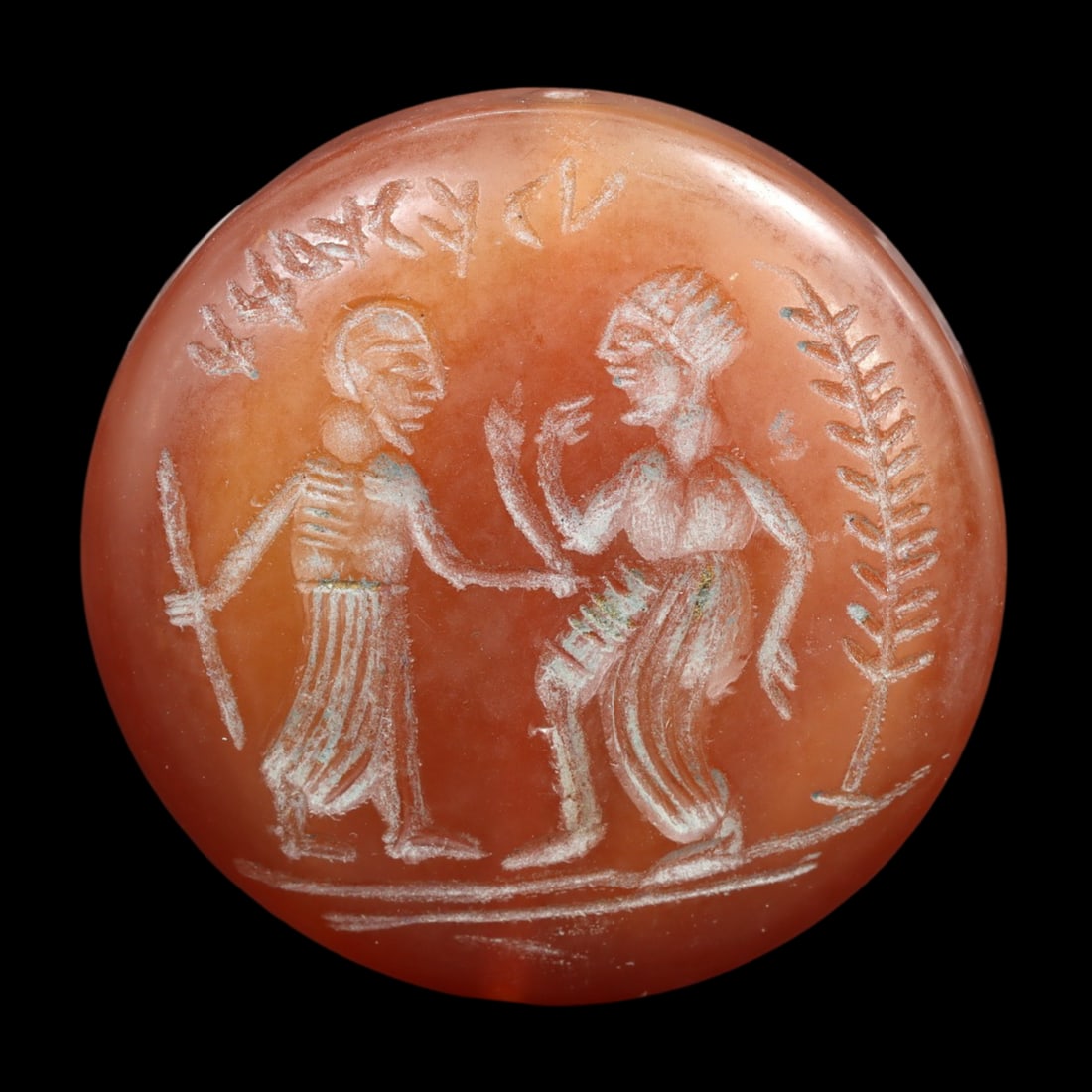 An Antique Islamic Carnelian Double Convex Stamp Seal Bead, c. 9th-12th Century: This double convex stamp seal bead, made from carnelian, exemplifies the exquisite craftsmanship and intricate design characteristic of Islamic artifacts from the 9th to 12th centuries. Such seal bead