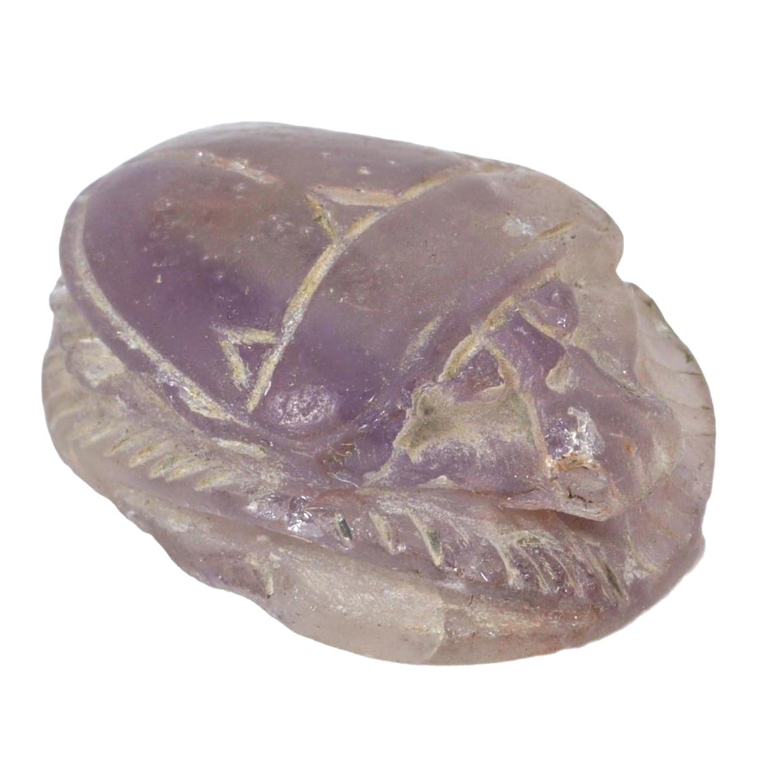 An Ancient Egyptian Amethyst Scarab Stamp Seal, Late Period, c. 664-332 BCE: Exemplifying the sophistication of Egyptian lapidary techniques, this amethyst scarab stamp seal carries the hallmarks of the Late Period. The underside of the seal bears hieroglyphs, suggesting its u