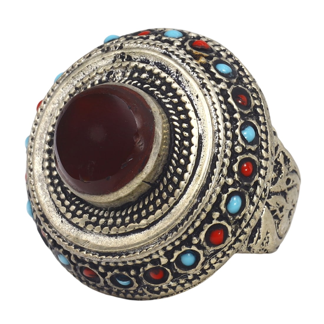 An Antique Ottoman Carnelian Gilt Silver Cocktail Ring: This striking cocktail ring, made from carnelian and gilt silver. This ring exemplifies the exquisite craftsmanship and intricate design characteristic of the Ottoman Empire's jewelry-making tradition