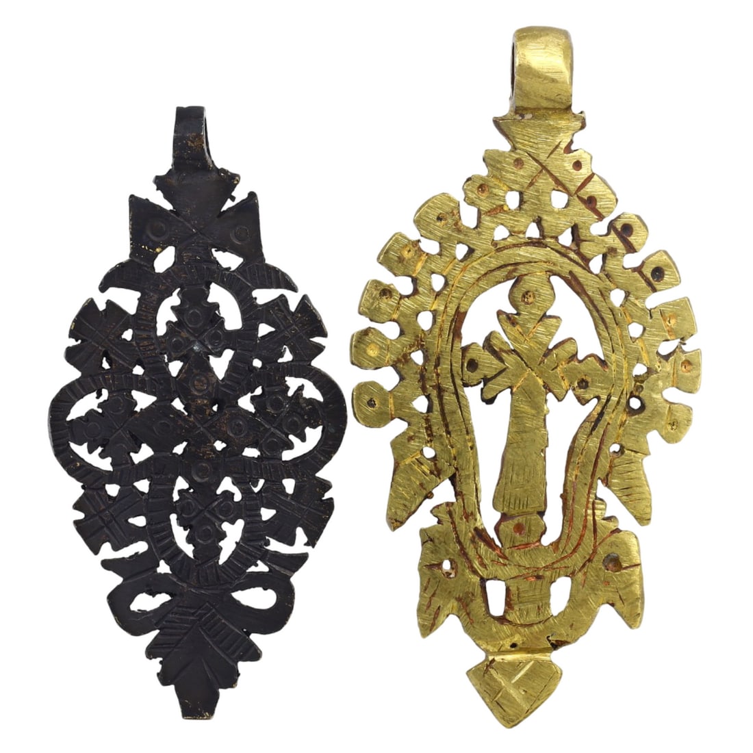 Lot of Vintage Medieval Brass Crosses: This lot of 2 crosses, made from brass. These crosses exemplify the intricate craftsmanship and deep religious significance of Coptic Ethiopian culture. Such objects were commonly used for religious c
