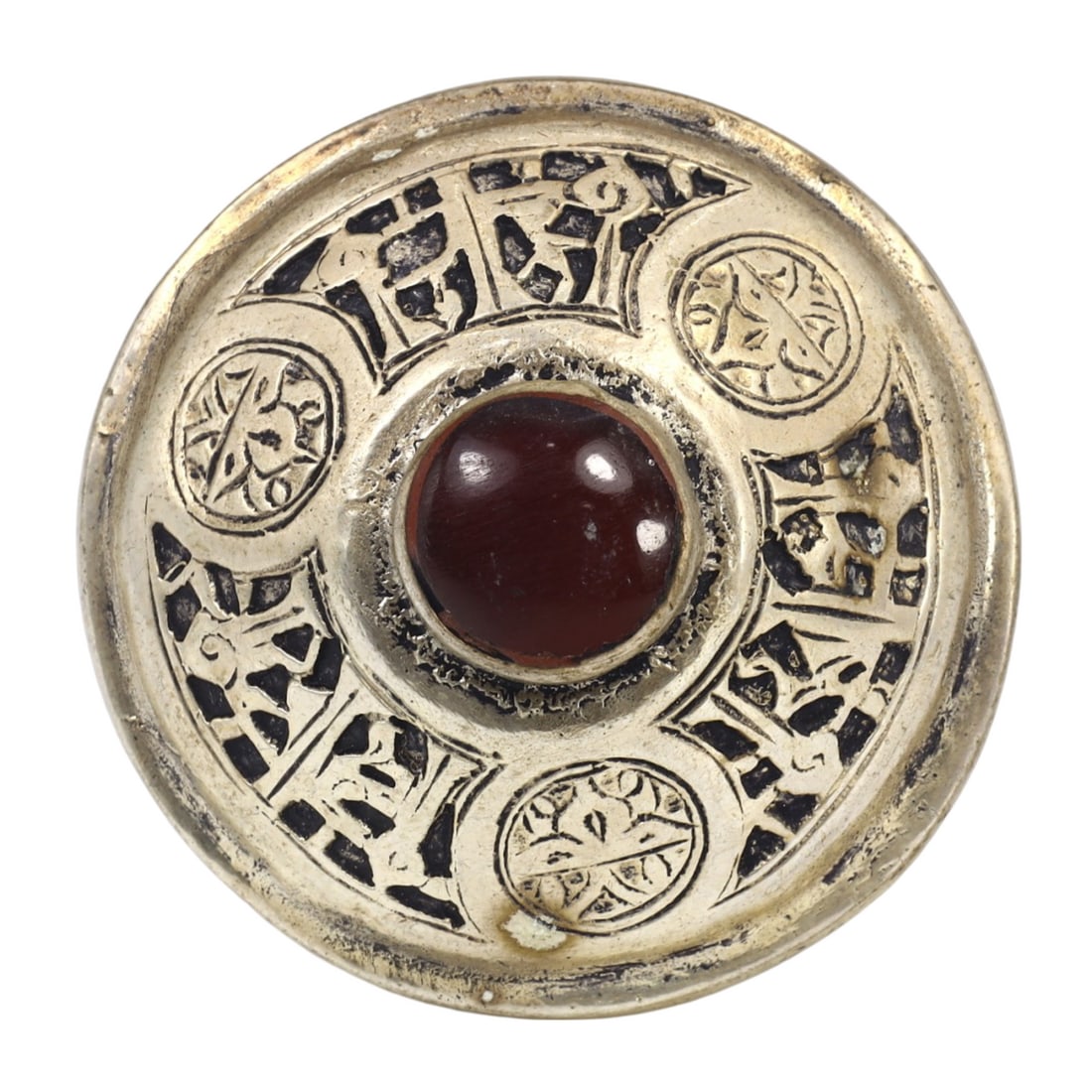 An Antique Ottoman Carnelian and Gilt Silver Cocktail Ring: This exquisite cocktail ring, made from carnelian and gilt silver, exemplifies the intricate craftsmanship and opulent aesthetic of the Ottoman Empire. This ring showcases the detailed metalwork and v