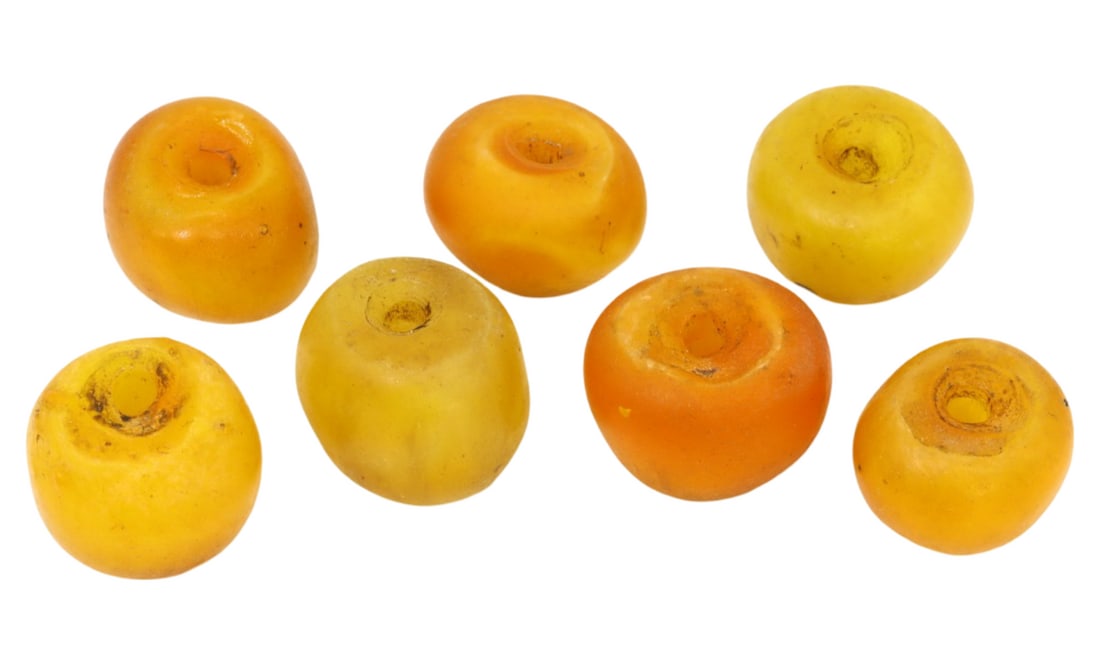 Lot of Antique Tibetan Pressed Amber Barrel Shape Beads, c. 18th-19th Century: This lot of 2 pressed amber barrel shape beads, made from pressed amber. These beads exemplify the skilled craftsmanship and intricate artistry of Tibetan artisans. Such beads were commonly used for p