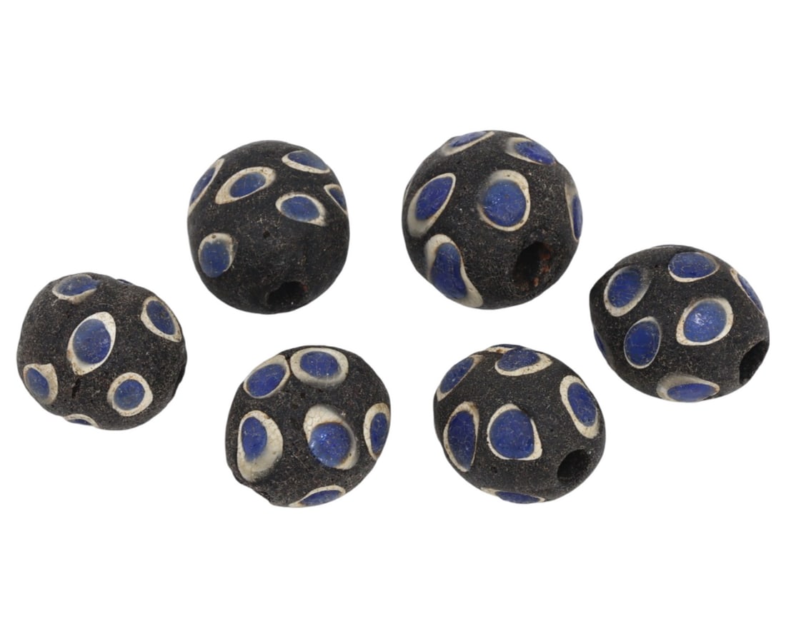 Group of 6 Antique Venetian Mosaic Glass Blue Evil Eye Beads: This group of six antique Venetian blue evil eye beads, made from material likely to be mosaic glass. These beads exemplify the intricate craftsmanship and cultural significance of the Renaissance per