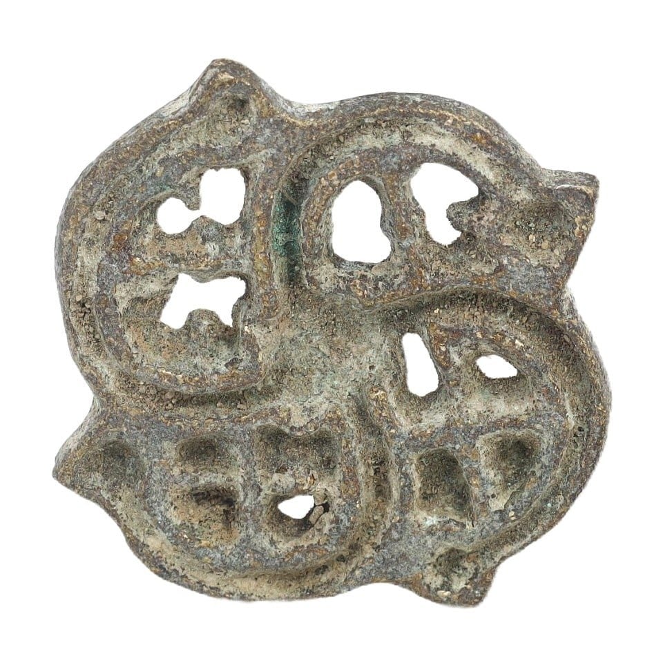 An Ancient Bactria-Margiana Bronze Openwork Stamp Seal, ca. late 3rd-early 2nd millennium BCE: Category: SealingsThis bronze stamp seal from the ancient Bactria-Margiana complex demonstrates exceptional craftsmanship with its detailed openwork design. The motifs, intricately carved into the dur