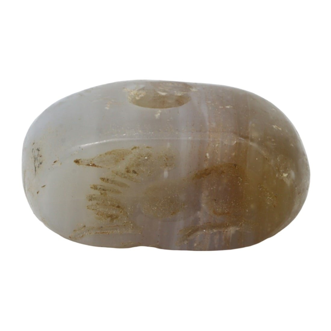 An Ancient Sasanian Carnelian Hemispherical Stamp Seal, c. 224-651 AD: This exquisite hemispherical stamp seal, made from warming peach and tan carnelian. Dating back to the Sasanian Empire (c. 224-651 AD), it exemplifies the sophisticated craftsmanship and intricate art